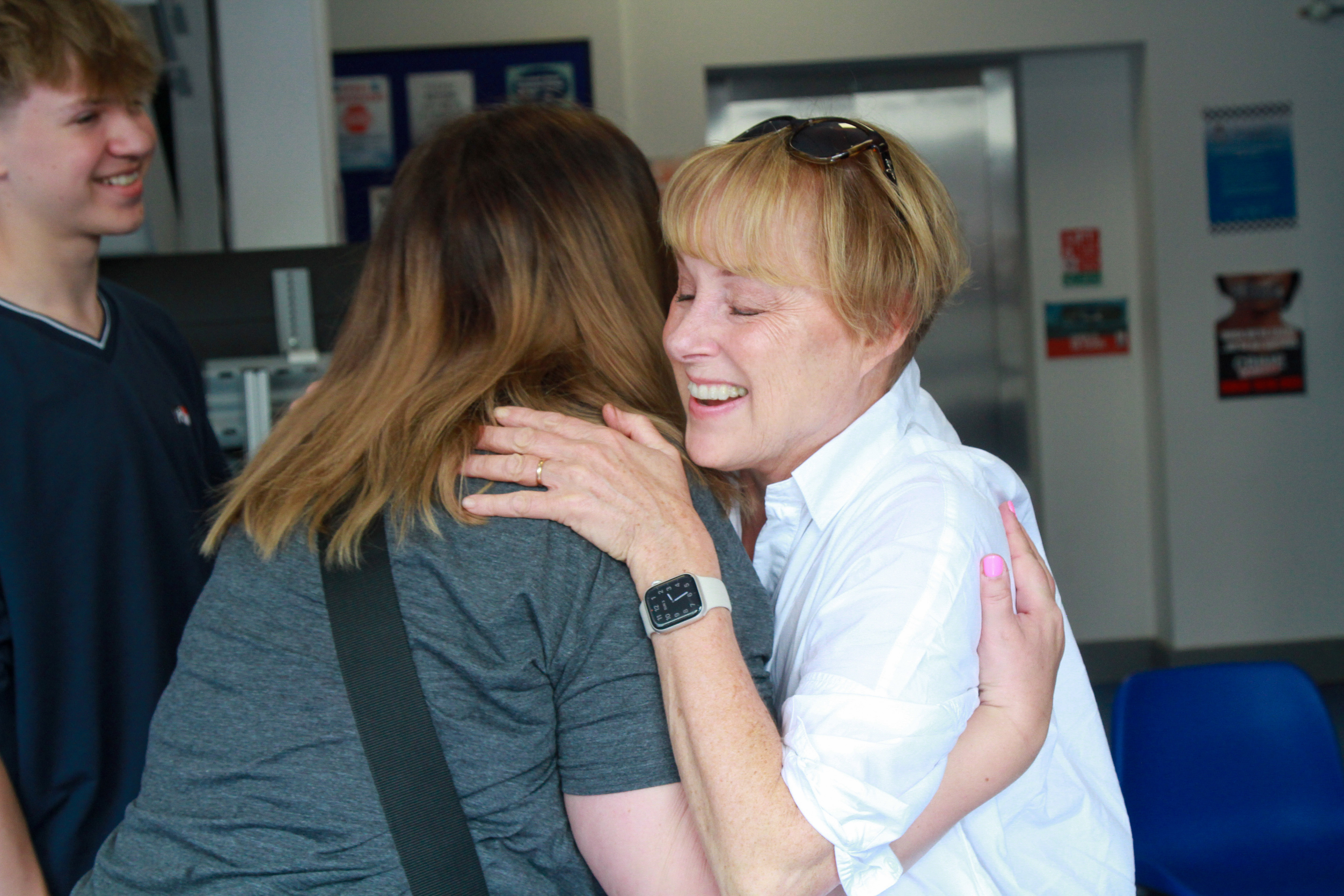 Sally Dynevor shares a warm hug with an excited fan at the Coronation Street Experience 